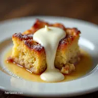 The Best Bread Pudding Recipe with Warm Vanilla Sauce