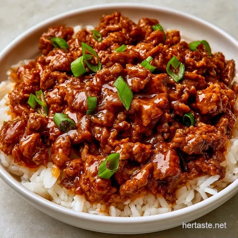 Polished white bowl showcasing glazed brown beef atop snowy rice with vibrant green onion curls and sesame seeds.